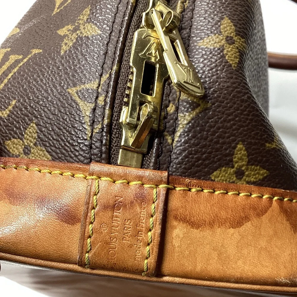 Louis Vuitton Monogram Alma Handbag Brown Coated Canvas Leather